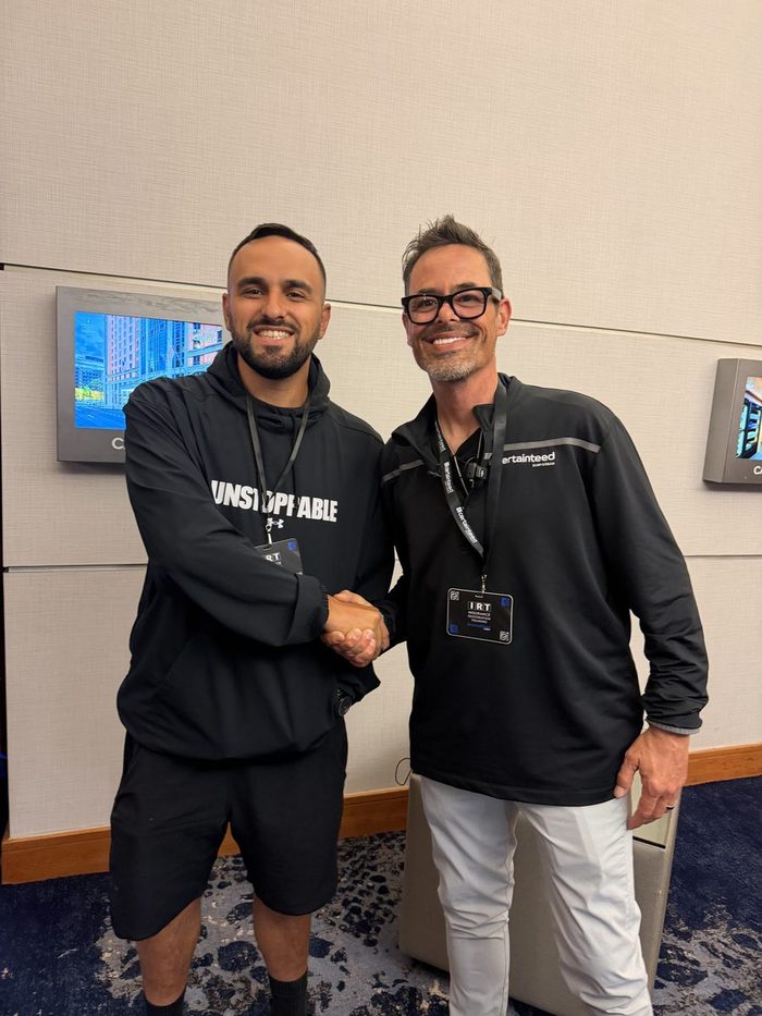 Becker Alrub with a CertainTeed representative at Insurance Restoration Training